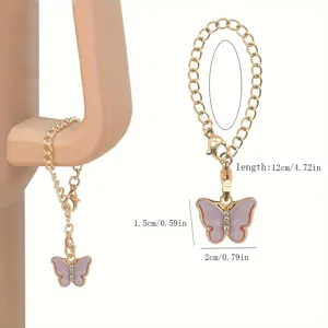 Joli porte-clés papillon et pendentif de tasse avec chaîne dorée et strass brillants.