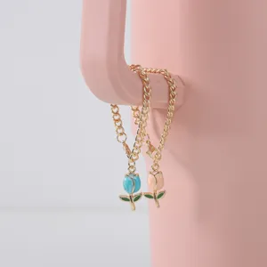 Close-up of cute tulip charm thick chain for cup, elegant enamel flower design detail view.