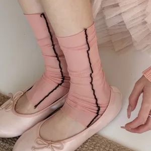 Pink sheer mesh leg warmers and stirrup socks, breathable ice silk summer hosiery for women.