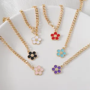 Minimalist chunky gold chain with colorful smiling flower pendants for Stanley cup charms.