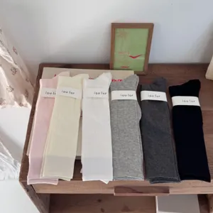 Basic ribbed calf socks in multiple colors, soft breathable cotton for daily wear.
