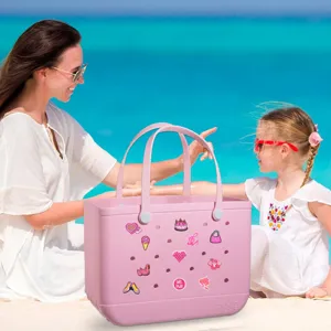 Bolso de playa de goma rosa con dijes bonitos, bolsa eva impermeable para vacaciones.