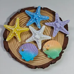 Ocean series starfish and seashell charms detail showing exquisite pearl and resin textures.