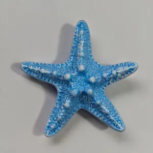 Blue starfish charm for hole bags, cute resin ocean style accessory detail view.
