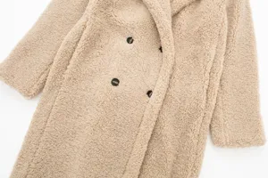 Beige fluffy teddy bear double breasted winter coat detail view warm cozy outerwear for women.