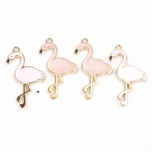 Detail view of cute flamingo alloy charms, pink enamel DIY jewelry making accessories.