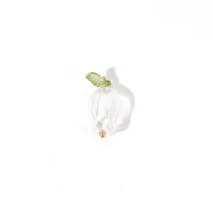Handcrafted crystal lily of the valley flower pendant DIY jewelry accessory detail view.