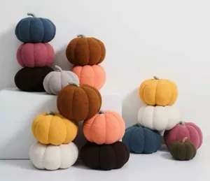 Nordic style cute pumpkin plush pillow detail showing soft texture and cozy home decor.