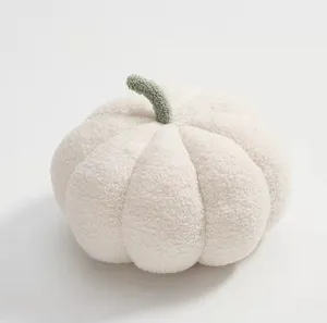 Detailed view of the white plush pumpkin throw pillow, soft cute sofa cushion for home decor.