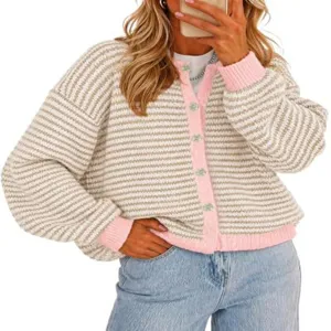 Detailed view of women's striped knit cardigan featuring pink contrast trim and stylish front buttons.