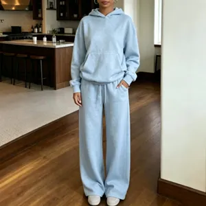 Set coordinato felpa con cappuccio e pantaloni della tuta azzurri donna casual