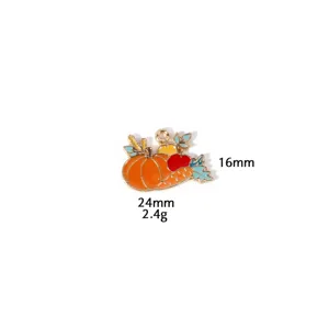Close-up detail of the Thanksgiving pumpkin enamel charm, colorful zinc alloy DIY part.