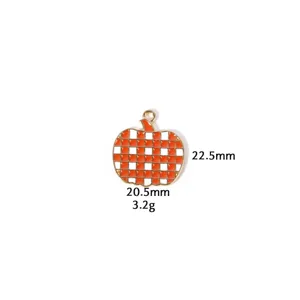 Thanksgiving pumpkin charm pendant detail view, zinc alloy material with orange white check.
