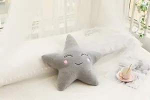 Gray star plush pillow detailed view, cute cartoon soft cushion for kids room decor and sofa.