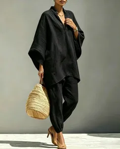 Stylish casual batwing sleeve V-neck top and loose pants set for women summer wear.