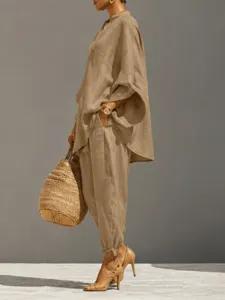 Detail view of the casual beige linen two-piece set featuring batwing sleeves and pants.