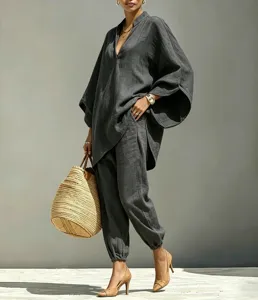 Detailed view of the casual oversized V-neck batwing sleeve tunic and pants set in dark grey.