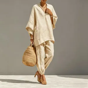 Casual oversized linen-style two-piece loungewear set featuring batwing sleeves and V-neck.