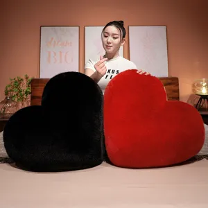 Cozy mink fleece heart-shaped plush pillow set in black and red, perfect soft home decor gift.