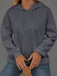 Damen lässiger lockerer Kapuzenpullover mit 3D geprägtem Monogramm Muster Langarm Oberteil