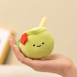 Schattige groene kokosnoot pluche sleutelhanger met rietje en lachend gezicht tasbedel