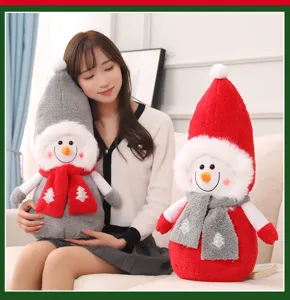 Cute Christmas snowman plush toy detail, soft stuffed doll with scarf for holiday gift.