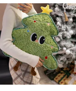 Niedliches Weihnachtsbaum Plüschkissen mit großen Augen und weichem Stoff für festliche Deko.
