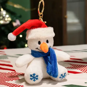 Joli porte-clés en peluche bonhomme de neige de Noël, douce poupée pour sac à main vue détaillée.