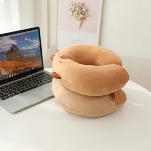 Capybara plush U-shaped neck pillow detail shot, soft travel pillow for office nap and car use.