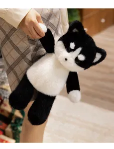 Cute black and white animal plush toy detail, fluffy soft doll for girls room decoration