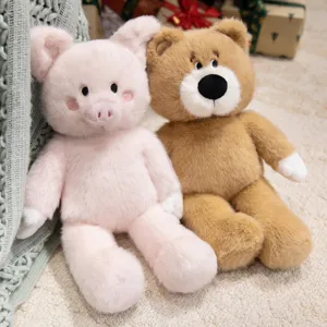 Cute plush animal toys set featuring a pink pig and brown bear sitting dolls for girls.