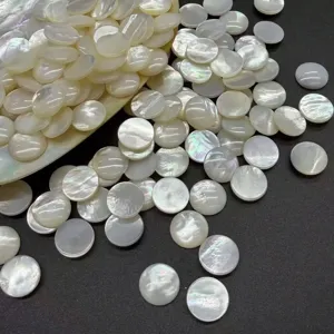 Close-up showing the iridescent texture of natural white mother of pearl cabochons