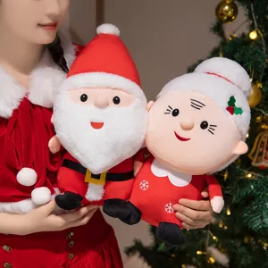 Süßes Weihnachtsplüschtier Set mit Weihnachtsmann und Frau für festliche Dekoration.