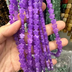 Macro view of purple star-shaped natural agate beads for jewelry making diy