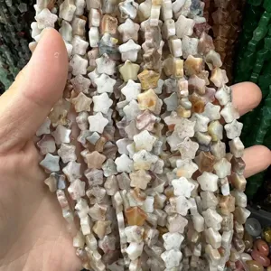 Close-up of 8mm star-shaped natural agate stone beads for DIY jewelry making