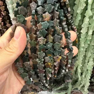 Macro detail view of 8mm star-shaped natural stone beads for handmade DIY jewelry making