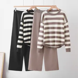 Detailed presentation of the cozy striped knitted sweater and wide-leg pants two-piece set.