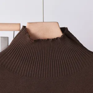 Close-up view of brown ribbed knit turtleneck sweater collar, premium texture and soft fabric.