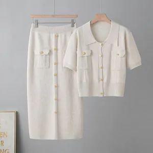 Beige knit polo top and midi skirt set with chic gold buttons for women detail view.