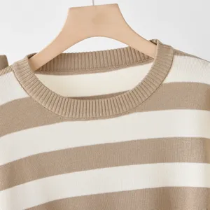 Close-up detail of women casual striped knit sweater neckline and soft texture fabric.