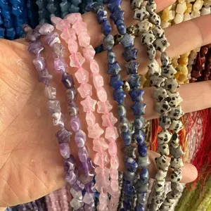 Macro view of 8mm star-shaped natural stone beads in assorted colors for jewelry making