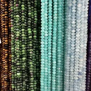 Detail view of 3x5mm faceted natural stone abacus beads in multiple colors