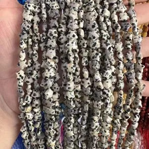 Detailed view of 8mm double-sided star-shaped dalmatian jasper stone beads for DIY jewelry
