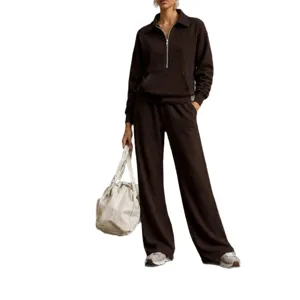 Casual women's brown half-zip sweatshirt and matching loose sweatpants two-piece tracksuit.