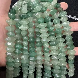 Close-up of green natural stone hexagonal prism loose beads for DIY jewelry making