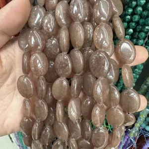 Makroansicht von 13x18mm lichtdurchlässigen ovalen braunen Natursteinperlen für Schmuck