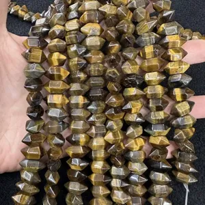 Close-up of natural Tiger Eye hexagonal prism beads for DIY jewelry making