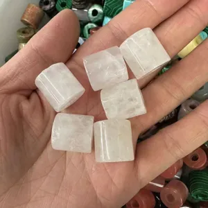 Close-up of 9x9mm white natural stone cylinder beads for DIY jewelry making