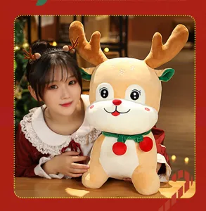 Cute Christmas reindeer plush toy soft stuffed animal doll holiday gift for kids and home decor.