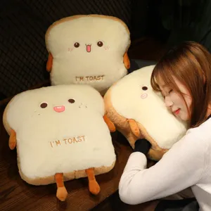 Cute toast plush pillow and hand warmer soft stuffed bread cushion for office desk nap time use.